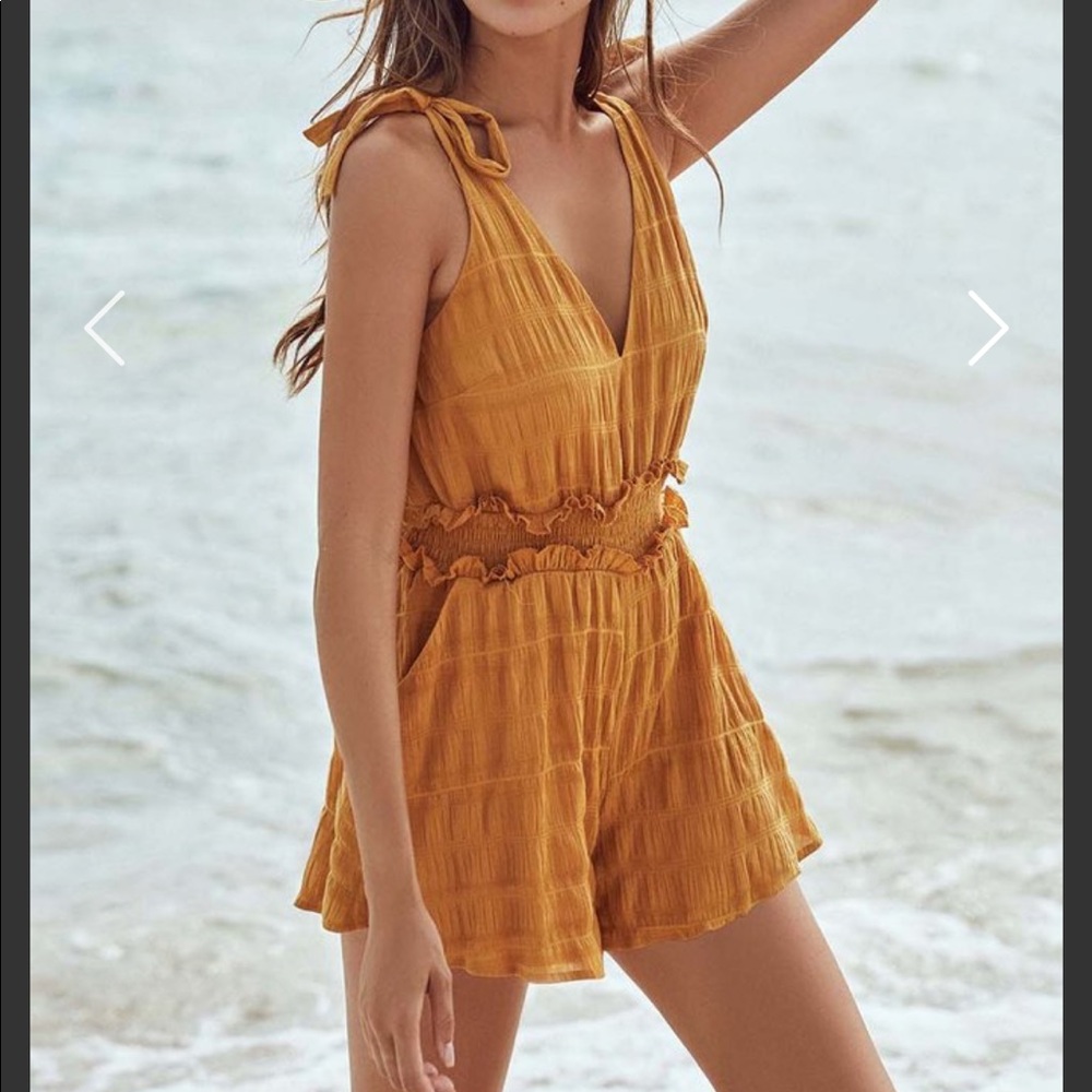 Yellow Romper XS never worn